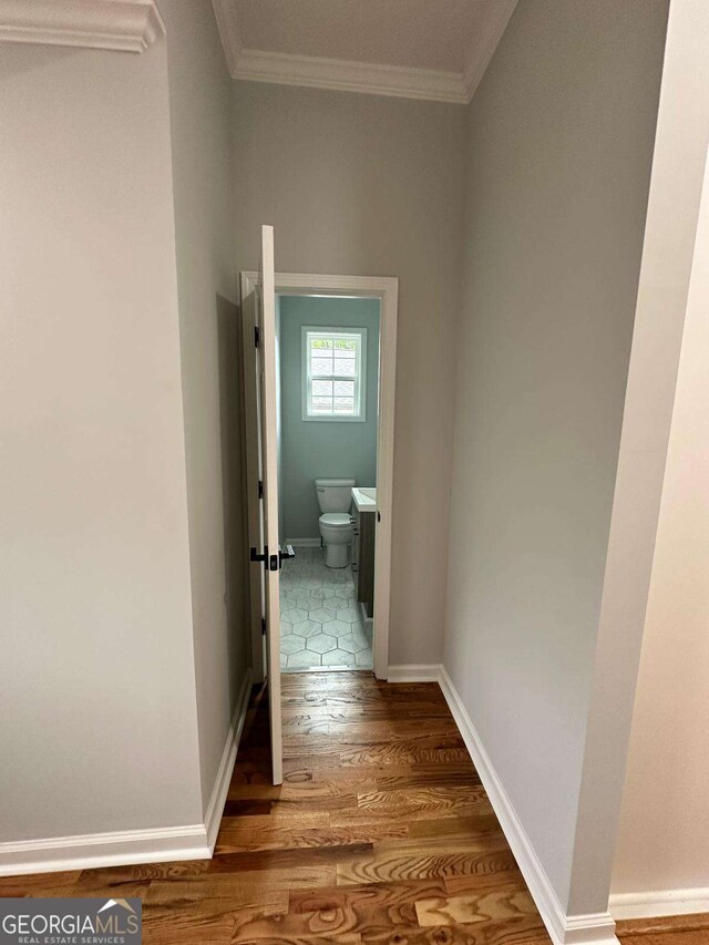 1766 W Lyle Ave, College Park, GA 30337 - corridor featuring wood finished floors and crown molding