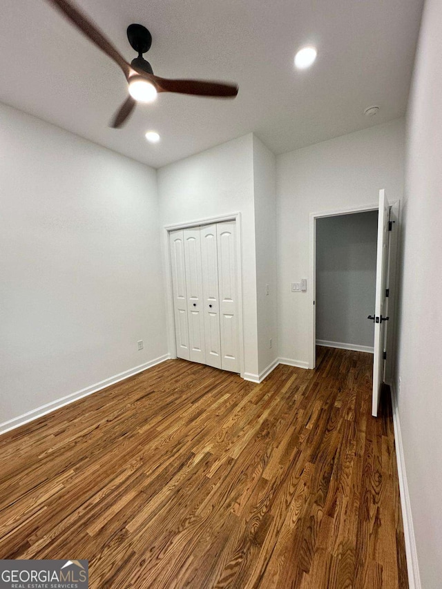 1766 W Lyle Ave, College Park, GA 30337 - unfurnished bedroom featuring dark wood finished floors, a closet, baseboards, recessed lighting, and ceiling fan