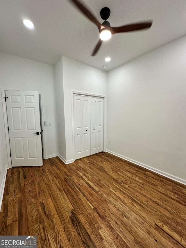 1766 W Lyle Ave, College Park, GA 30337 - unfurnished bedroom featuring dark wood-type flooring, recessed lighting, a closet, and a ceiling fan