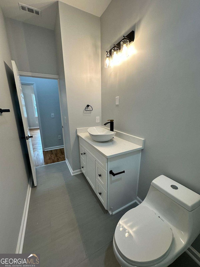 1766 W Lyle Ave, College Park, GA 30337 - bathroom featuring vanity and baseboards