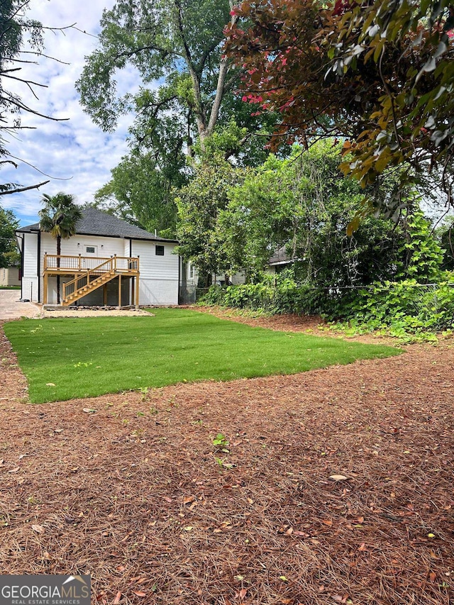 1766 W Lyle Ave, College Park, GA 30337 - view of grassy yard with stairway and a deck