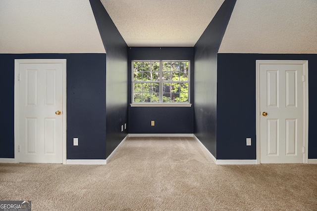40 Briarwood Ln, Newnan, GA 30265 - additional living space featuring carpet floors, a textured ceiling, and baseboards