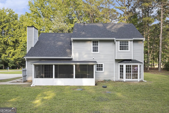 40 Briarwood Ln, Newnan, GA 30265 - back of property featuring a sunroom, a chimney, a shingled roof, and a lawn