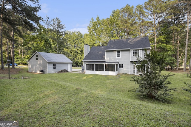40 Briarwood Ln, Newnan, GA 30265 - rear view of property featuring a sunroom, a chimney, a yard, and roof with shingles