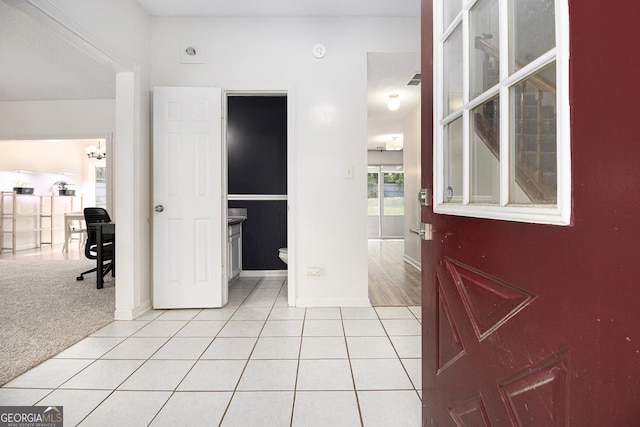 40 Briarwood Ln, Newnan, GA 30265 - corridor with light tile patterned floors and baseboards