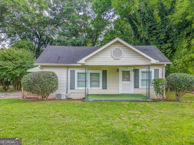 308 E 20th St SW, Rome, GA 30161 - single story home with a porch, a front yard, a shingled roof, and ac unit