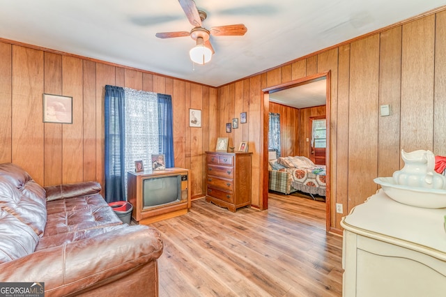308 E 20th St SW, Rome, GA 30161 - bedroom featuring light wood-style floors, wood walls, and ceiling fan