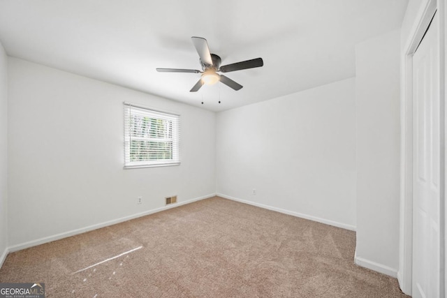 801 N Evelyn Pl NW, Atlanta, GA 30318 - carpeted spare room with ceiling fan and baseboards