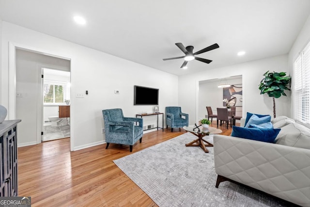 801 N Evelyn Pl NW, Atlanta, GA 30318 - living area with light wood-type flooring, ceiling fan, and recessed lighting