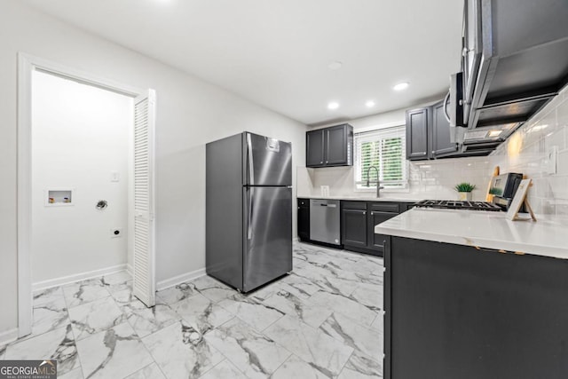 801 N Evelyn Pl NW, Atlanta, GA 30318 - kitchen featuring stainless steel appliances, light marble finish floors, light countertops, recessed lighting, and decorative backsplash