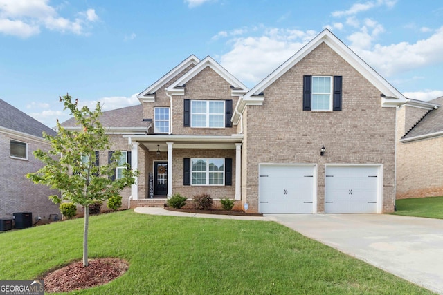 2031 Broadmoor Way, Fairburn, GA 30213 - craftsman inspired home with brick siding, a front yard, driveway, and a garage