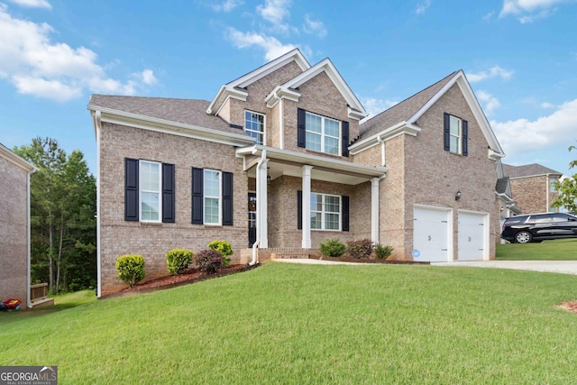 2031 Broadmoor Way, Fairburn, GA 30213 - view of front facade featuring brick siding, driveway, a garage, and a front yard