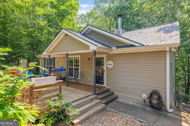 392 Pine Trl, Dahlonega, GA 30533 - back of property with roof with shingles