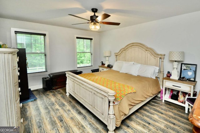 1040 Matthew Ln, Madison, GA 30650 - bedroom featuring wood finished floors, ceiling fan, and baseboards