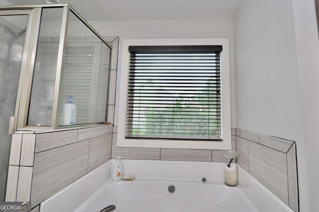 1040 Matthew Ln, Madison, GA 30650 - full bathroom with a garden tub and an enclosed shower