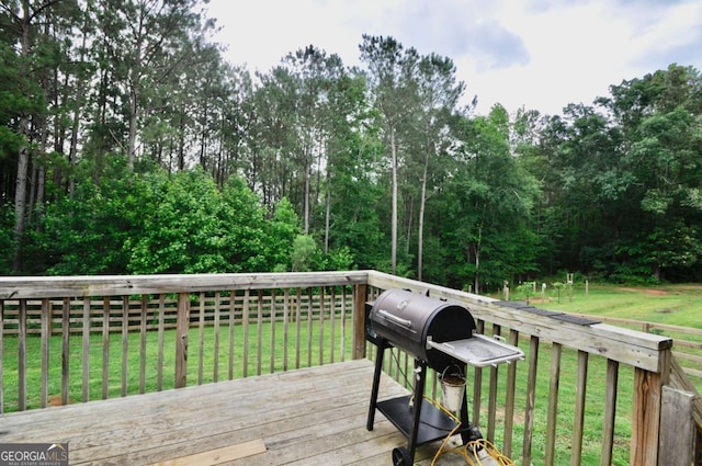 1040 Matthew Ln, Madison, GA 30650 - wooden deck featuring a lawn and area for grilling