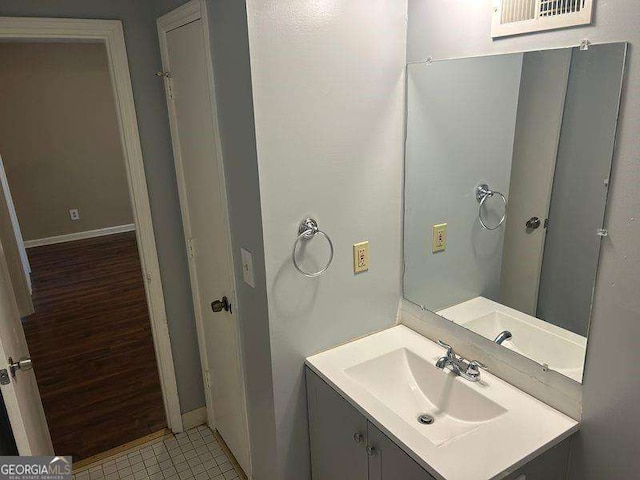 3674 Riverchase Ter, Decatur, GA 30034 - bathroom featuring vanity, baseboards, and tile patterned flooring