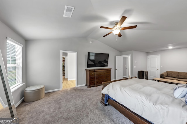 2037 Cedar Grove Rd, Conley, GA 30288 - bedroom with vaulted ceiling, light carpet, baseboards, and a ceiling fan