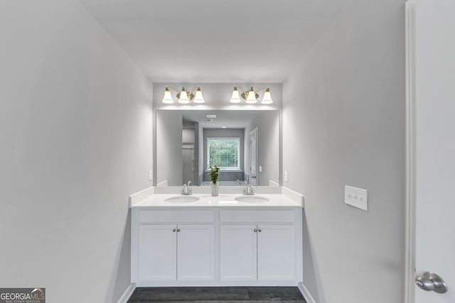 2037 Cedar Grove Rd, Conley, GA 30288 - bathroom featuring double vanity and baseboards