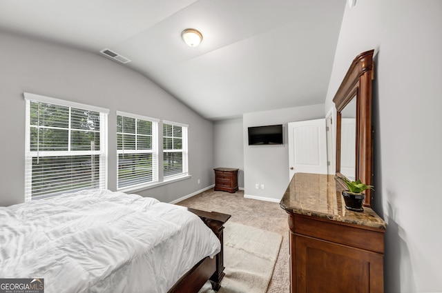 2037 Cedar Grove Rd, Conley, GA 30288 - bedroom featuring lofted ceiling, light carpet, and baseboards
