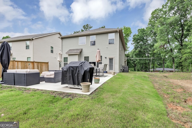 2037 Cedar Grove Rd, Conley, GA 30288 - back of house featuring an outdoor hangout area, a patio, central AC, and a lawn