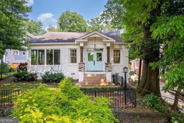 937 Rosedale Rd NE, Atlanta, GA 30306 - view of front of house featuring brick siding and a shingled roof