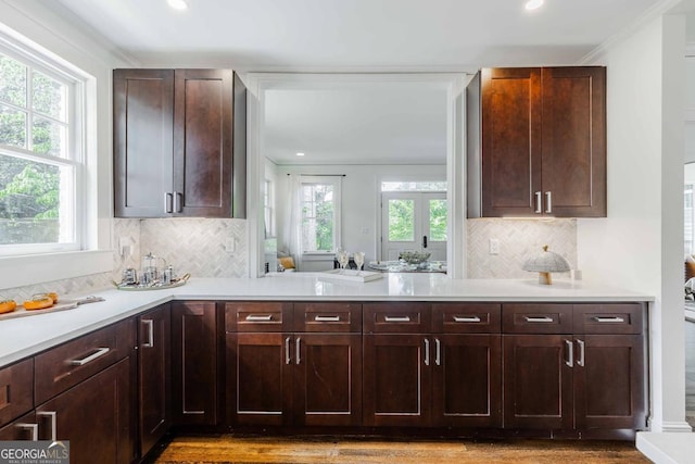 937 Rosedale Rd NE, Atlanta, GA 30306 - kitchen with light countertops, healthy amount of natural light, crown molding, decorative backsplash, and recessed lighting