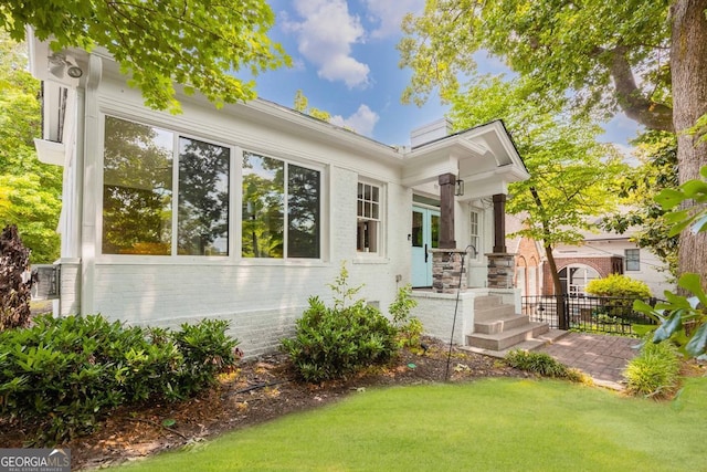 937 Rosedale Rd NE, Atlanta, GA 30306 - view of front of property with brick siding and a chimney