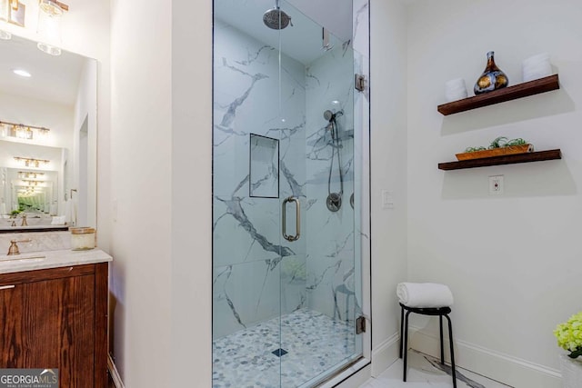 937 Rosedale Rd NE, Atlanta, GA 30306 - bathroom with a marble finish shower, vanity, and marble finish flooring