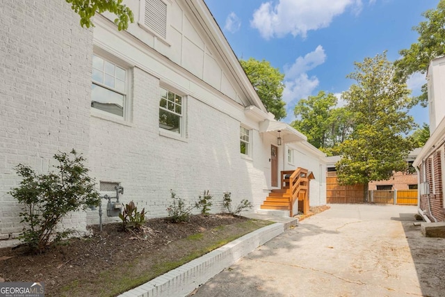 937 Rosedale Rd NE, Atlanta, GA 30306 - view of side of property with brick siding and a patio