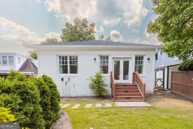 937 Rosedale Rd NE, Atlanta, GA 30306 - rear view of property featuring french doors, brick siding, and entry steps