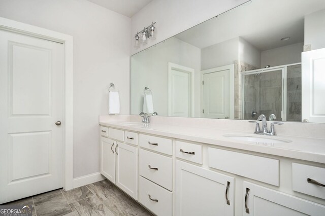 2026 Forte Ln, Alpharetta, GA 30009 - full bath with double vanity, a stall shower, marble look tile flooring, and baseboards