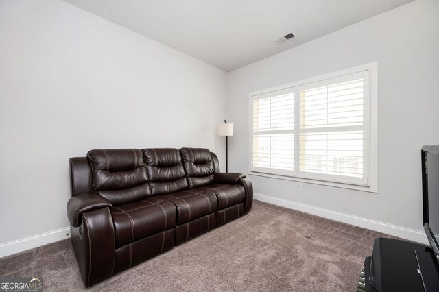2026 Forte Ln, Alpharetta, GA 30009 - living room featuring baseboards and carpet