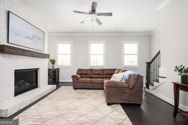 2026 Forte Ln, Alpharetta, GA 30009 - living area with baseboards, wood finished floors, ornamental molding, stairway, and plenty of natural light