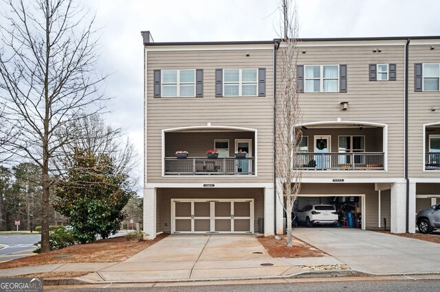 2026 Forte Ln, Alpharetta, GA 30009 - view of front of property featuring an attached garage and driveway