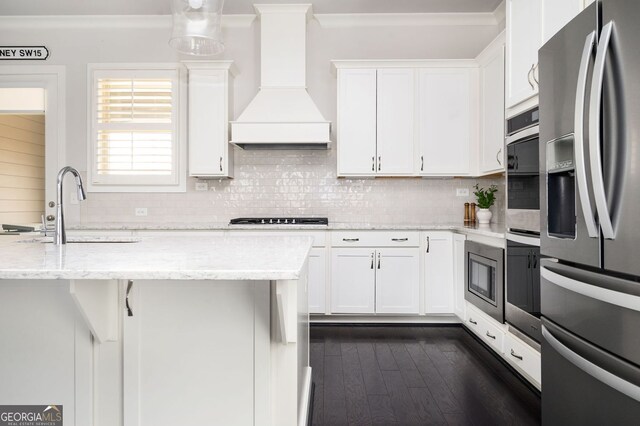 2026 Forte Ln, Alpharetta, GA 30009 - kitchen with appliances with stainless steel finishes, custom range hood, a sink, white cabinetry, and crown molding