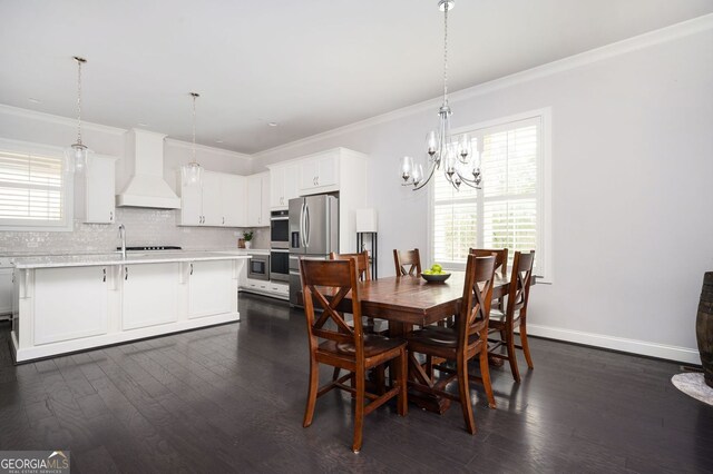 2026 Forte Ln, Alpharetta, GA 30009 - dining space featuring ornamental molding, a chandelier, plenty of natural light, dark wood-style floors, and baseboards