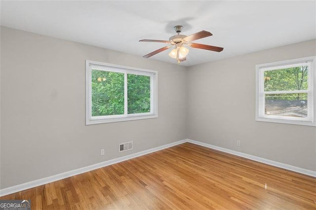 2358 Dabney Ter, East Point, GA 30344 - unfurnished room featuring baseboards, ceiling fan, and light wood finished floors