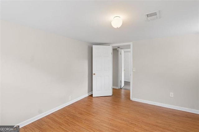 2358 Dabney Ter, East Point, GA 30344 - empty room featuring baseboards and light wood-style flooring