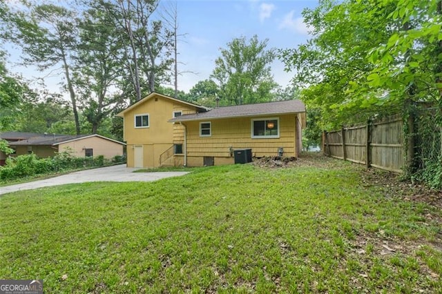 2358 Dabney Ter, East Point, GA 30344 - back of property with central AC and a patio area