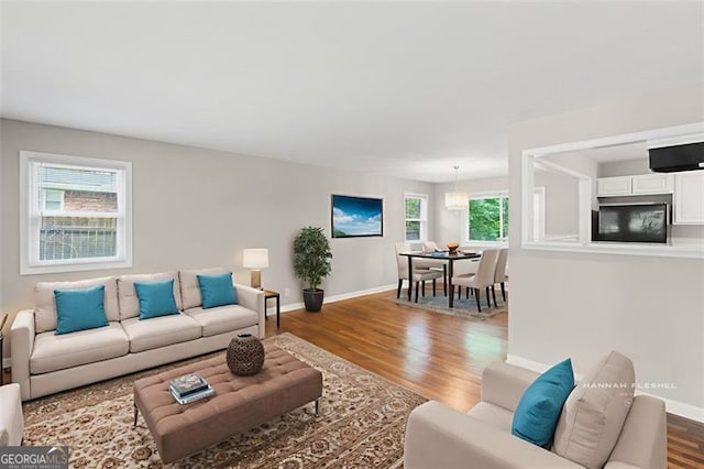 2358 Dabney Ter, East Point, GA 30344 - living area with wood finished floors and baseboards