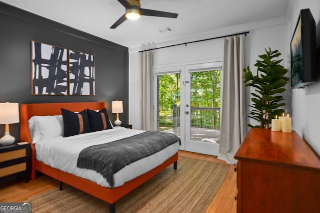223 Mango Cir, Ellijay, GA 30540 - bedroom featuring access to outside, wood finished floors, and ceiling fan
