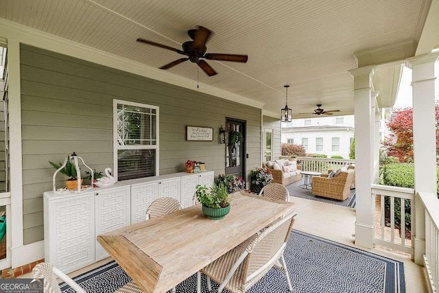 1901 Franklin Grove Pkwy, Bogart, GA 30622 - covered porch with a ceiling fan and outdoor dining space