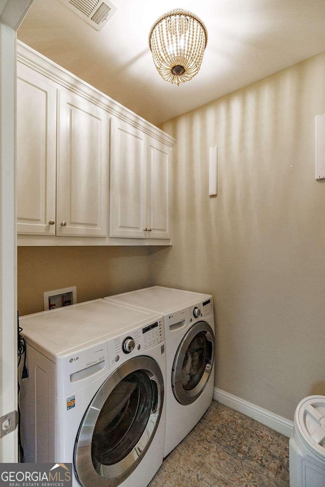 1901 Franklin Grove Pkwy, Bogart, GA 30622 - washroom featuring cabinet space, washer and clothes dryer, and baseboards