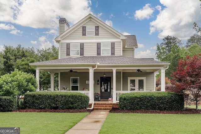 1901 Franklin Grove Pkwy, Bogart, GA 30622 - view of front of home featuring a ceiling fan, a front lawn, covered porch, and a chimney