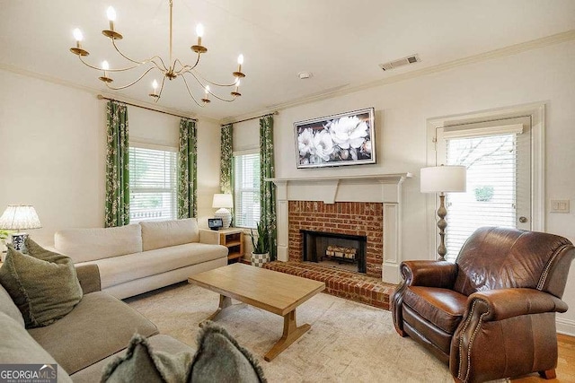 1901 Franklin Grove Pkwy, Bogart, GA 30622 - living area featuring crown molding, a chandelier, plenty of natural light, and a brick fireplace