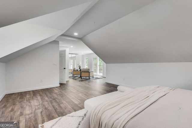 14440 Cogburn Rd, Alpharetta, GA 30004 - bedroom with wood finished floors, baseboards, lofted ceiling, and recessed lighting