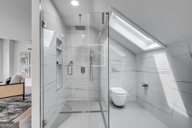 14440 Cogburn Rd, Alpharetta, GA 30004 - full bath with a skylight, a marble finish shower, toilet, and vaulted ceiling