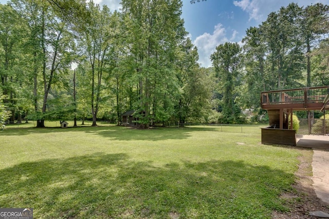14440 Cogburn Rd, Alpharetta, GA 30004 - view of yard with a wooden deck