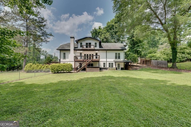 14440 Cogburn Rd, Alpharetta, GA 30004 - back of house with stairway, a deck, and a chimney